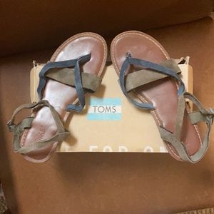 Toms brand sandals. Brown and blue leather straps. Gently worn Size 7.5